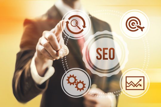 Search engine optimization concept man pointing SEO